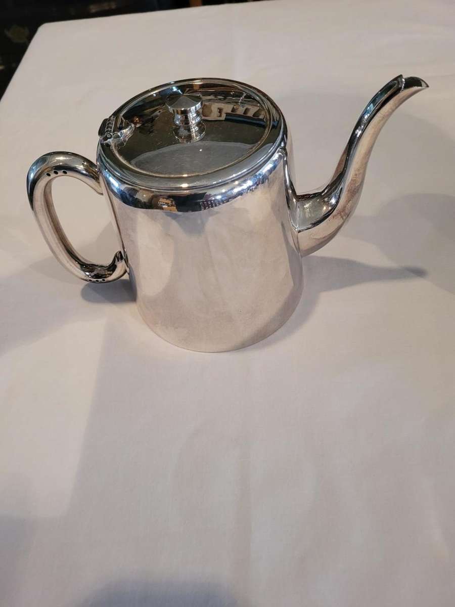 Hotel tea and coffee serving set-silver plated four piece set. Shiny and worthy of occasions