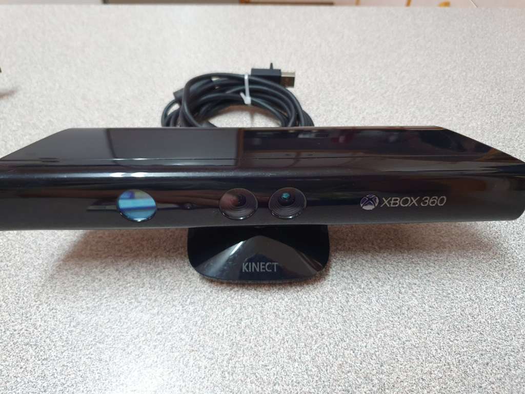 Xbox 360 E 4GB with Kinect and 2 Controllers
