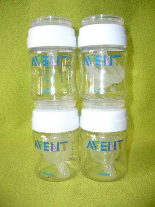 **** 4 X AVENT Newborn Bottles plus 7 Newborn Teats ****