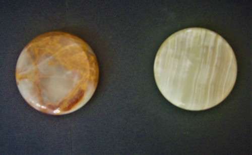 MARBLE/ ONYX EGGS - SET OF TWO ON ROUND ALABASTER ONYX STANDS cm and cm