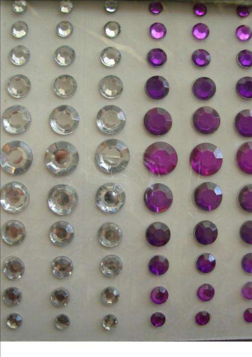 BLING :  6 different sizes:  clear and dark purple  (66 per packet)