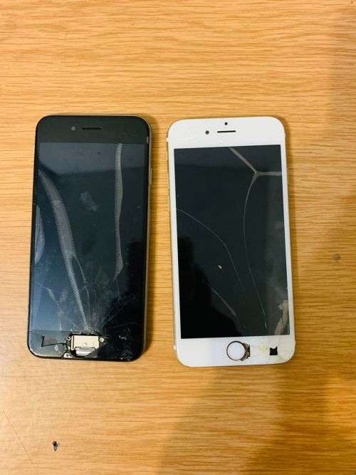 Bundle of damaged phones up for Grabs in one Bid! Can be repairred or used for  parts!