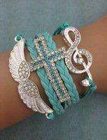 Infinity Bracelet rhinestone blue. music wings cross