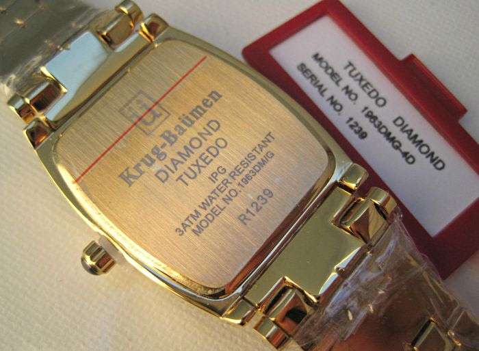 RETAIL: R11,220.21 Krug Baümen MEN Tuxedo 4 Natural Diamond White Dial 18Kt Gold Strap Watch