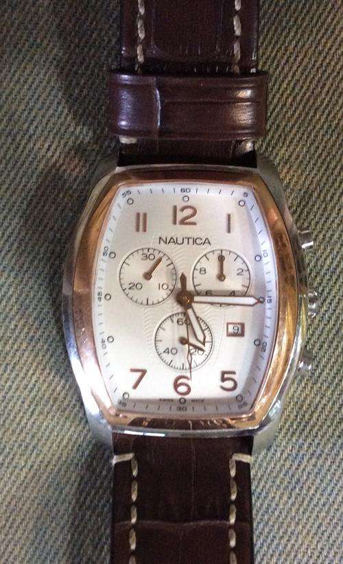 Great almost new Swiss Made Nautica Mens watch in excellent condition. NO RESERVE