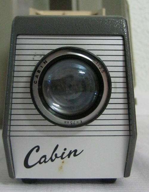 OLD CABIN PROJECTOR IN CASE AND STILL IN ITS ORIGINAL BOX