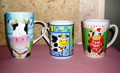 FOR THE COLLECTER MUGS WITH PICTURES OF COWS