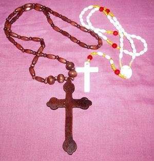 PRAYER BEADS (ROSARY)A STRING OF BEADS BY WICH PRAYERS ARE COUNTED.