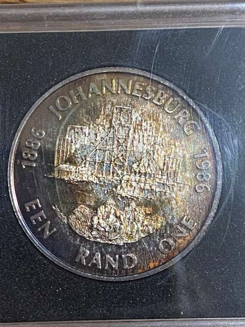 1986 Silver R1 Johannesburg. Beautiful Toning. Encapsulated