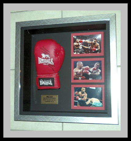 MIKE TYSON AUTOGRAPHED BOXING GLOVE WITH COA