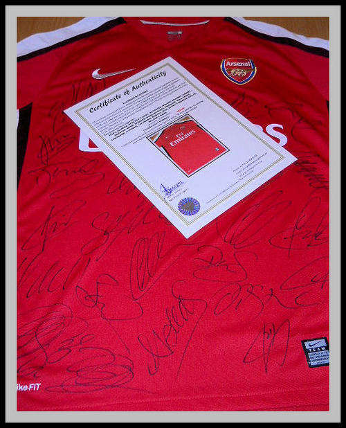 ARSENAL 2009/2010 SQUAD SIGNED HOME SHIRT WITH COA