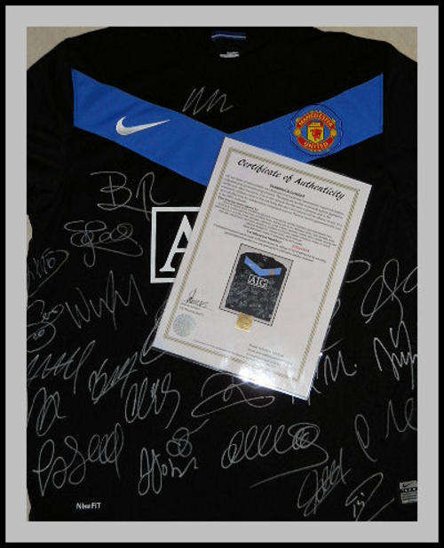 MANCHESTER UNITED 2009/2010 SQUAD SIGNED AWAY SHIRT WITH CERTIFICATE OF AUTHENTICITY