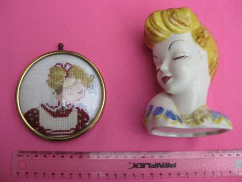 Ceramic vase and embroidered piece in the same theme.