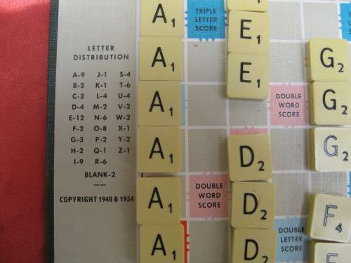 Scrabble Game.  Complete with all the tiles.