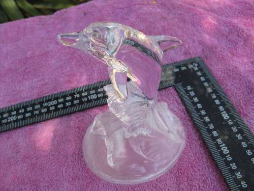 Glass dolphin ornament.