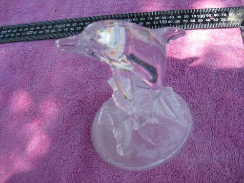 Glass dolphin ornament.