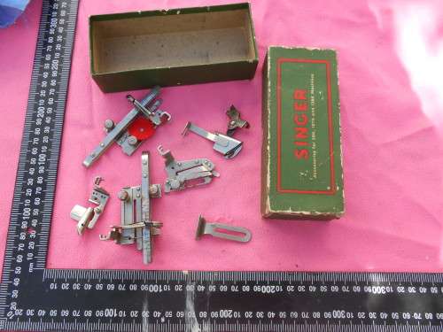 Singer sewing machine accessories.