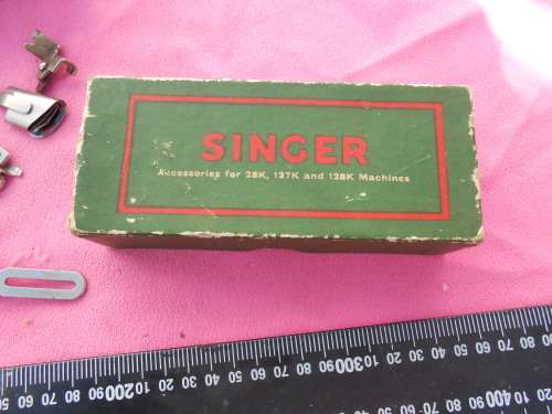 Singer sewing machine accessories.