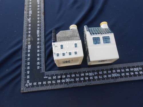 Blue Delft`s exclusively made for KLM by Bols Royal Distilleries Holland.  Houses no`s. 50 and 87.