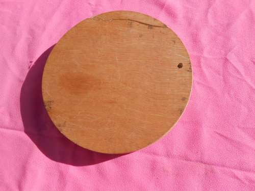 Cheese board with swivel wooden case enclosing knives.  Ready to place on the dining room table.