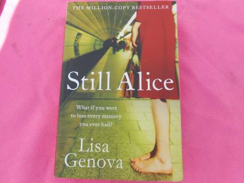 `Still Alice`  Lisa Genova.  Soft cover.