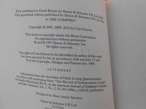 `Still Alice`  Lisa Genova.  Soft cover.