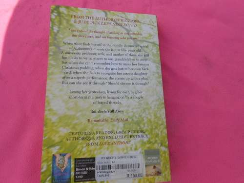 `Still Alice`  Lisa Genova.  Soft cover.