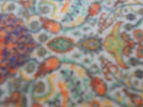 Carpet place-mats or may be suitable as Doll`s-house-sized carpets.