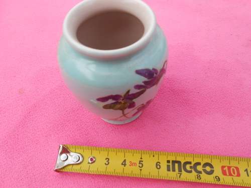 Small (55mm x 90mm high) Poole vase.