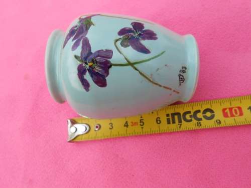 Small (55mm x 90mm high) Poole vase.