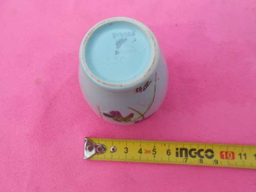 Small (55mm x 90mm high) Poole vase.