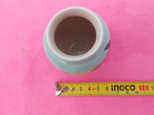 Small (55mm x 90mm high) Poole vase.