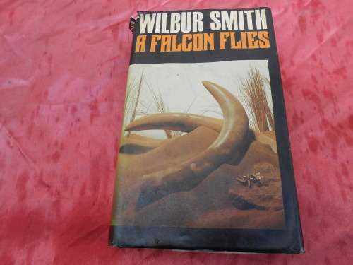 `A Falcon Flies`  Wilbur Smith.  Hard cover.