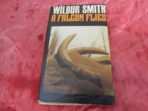 `A Falcon Flies`  Wilbur Smith.  Hard cover.
