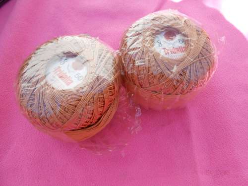 2 balls of crochet cotton thread.