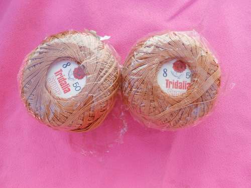 2 balls of crochet cotton thread.