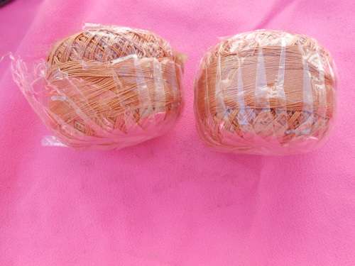 2 balls of crochet cotton thread.