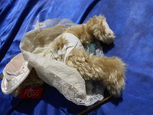 Russ Teddy bear named `Bronwyn`.  Sales label still attached.