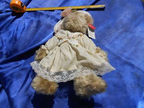 Russ Teddy bear named `Bronwyn`.  Sales label still attached.