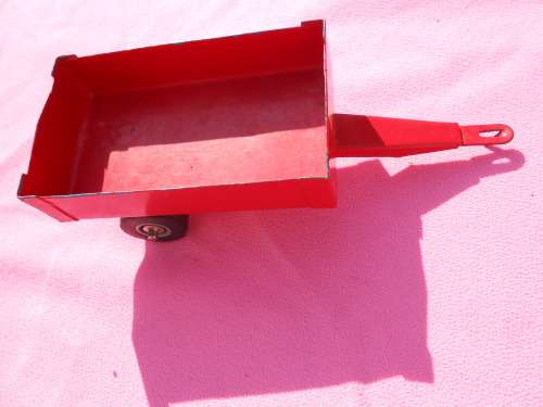 Strike tin-plate tractor and trailer.  Made in South Africa.  Condition as per photos.
