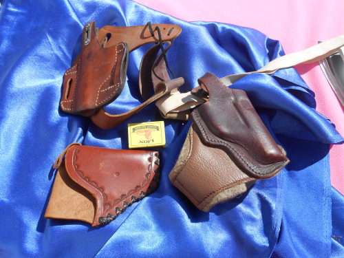 Leather pistol/gun holsters.