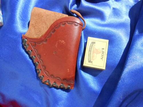 Leather pistol/gun holsters.