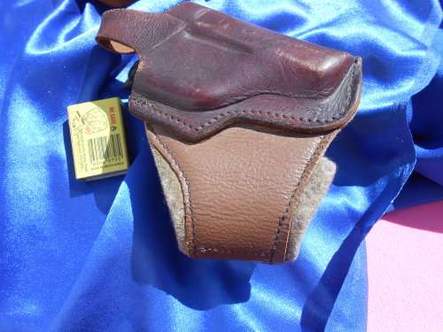 Leather pistol/gun holsters.