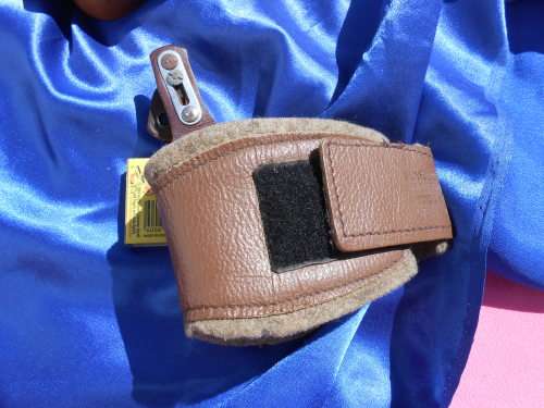 Leather pistol/gun holsters.