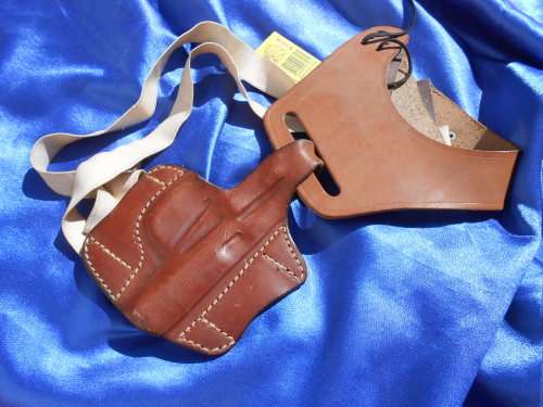 Leather pistol/gun holsters.