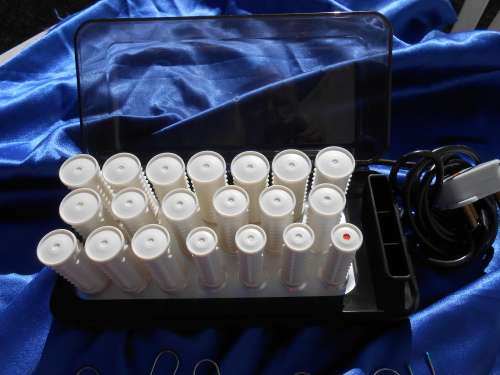 Carmen, electric, heated curlers.  In perfect working condition.