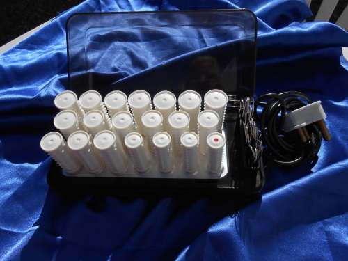 Carmen, electric, heated curlers.  In perfect working condition.