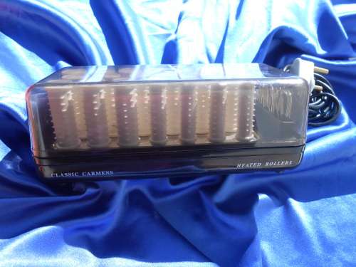 Carmen, electric, heated curlers.  In perfect working condition.