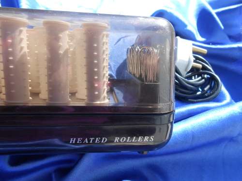 Carmen, electric, heated curlers.  In perfect working condition.