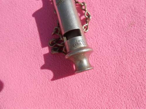 Police whistle.